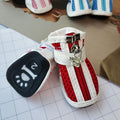 Blue zipper dog shoes for small pets showing non-slip sole and fleece lining.