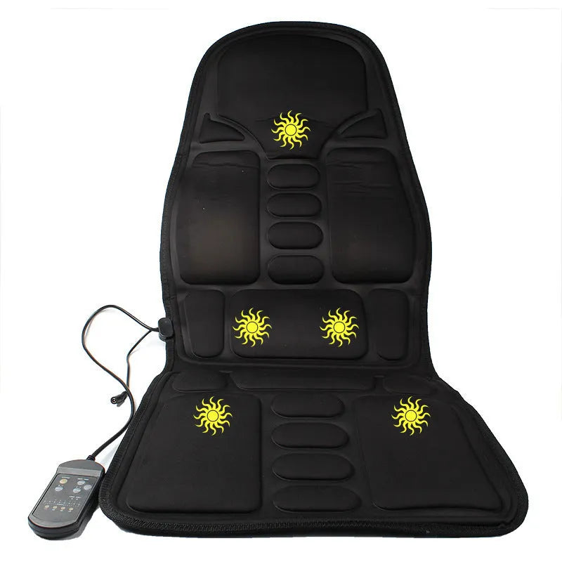 Black heating massage mat with infrared function and a separate seat cushion on a floor.