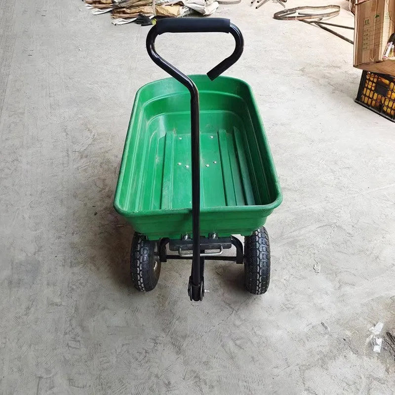 Green four-wheel plastic dump truck with steel PP construction for garden and farm material transport