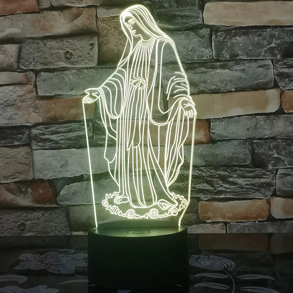 3D LED night light showing colourful dual ring pattern, with remote control and USB cable.