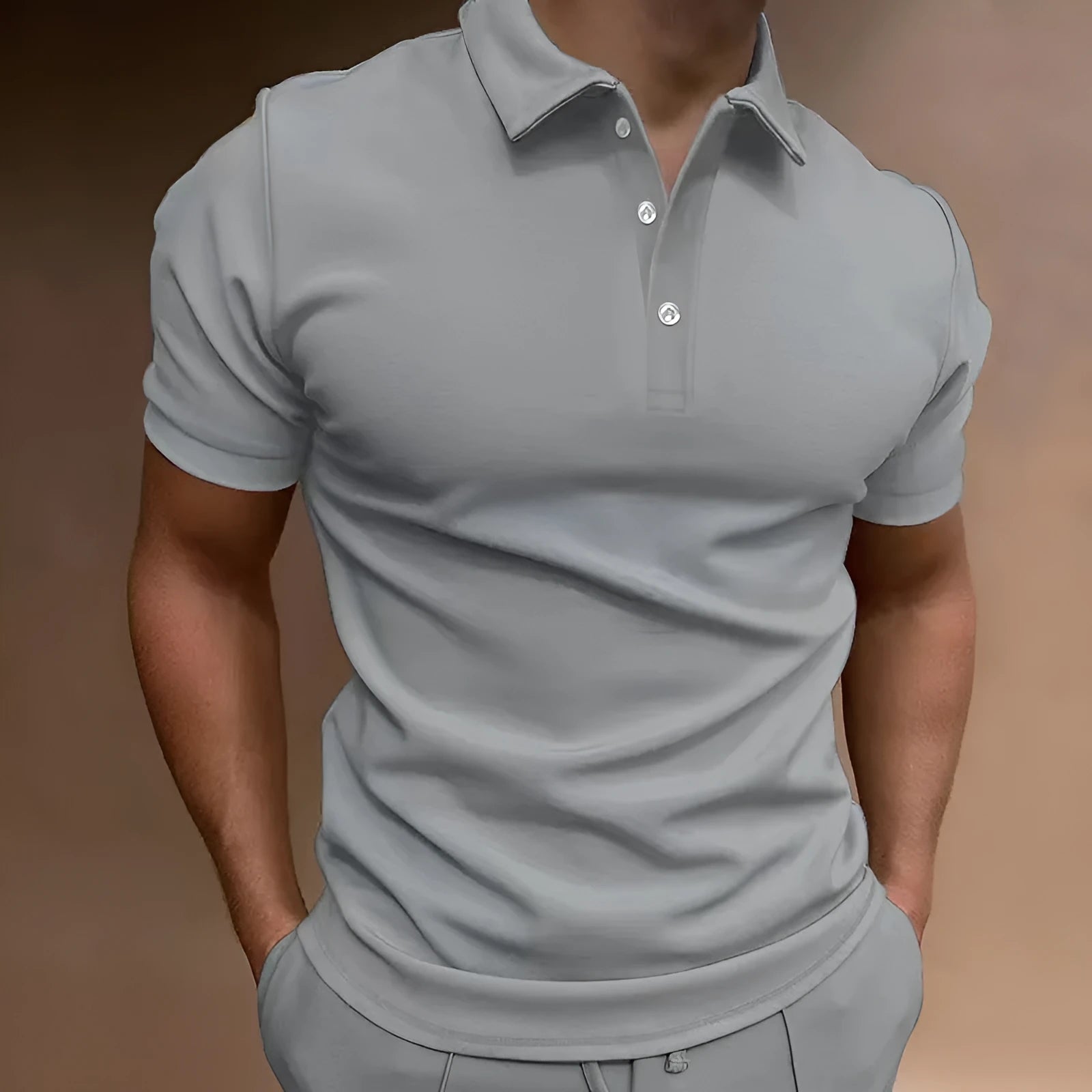 Men's grey loose-fit button t-shirt with short sleeves, made from cotton blend fabric.