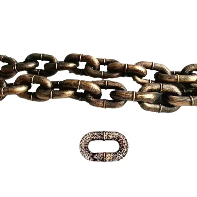 Bronze coloured plastic dog leash simulation prop for video spoofs on a plain background.