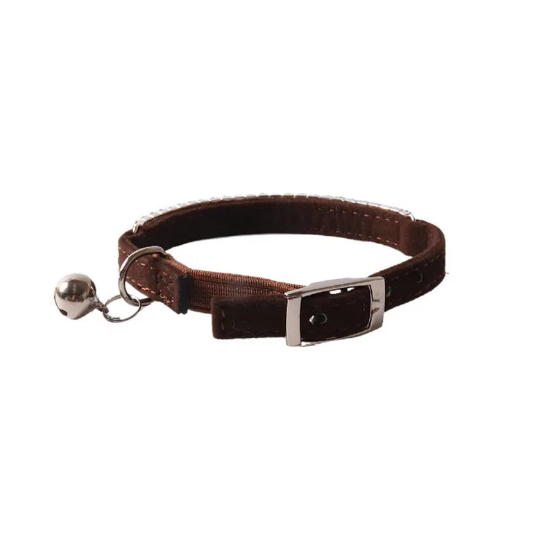 Soft flocking cat collar with elastic buckle and gang drill design in multiple colours.