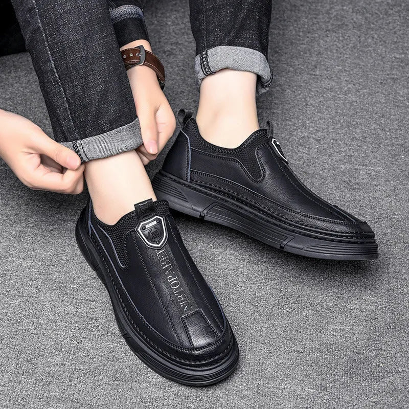 A pair of men's solid colour casual leather shoes with a round toe, shown in black and brown colour options.