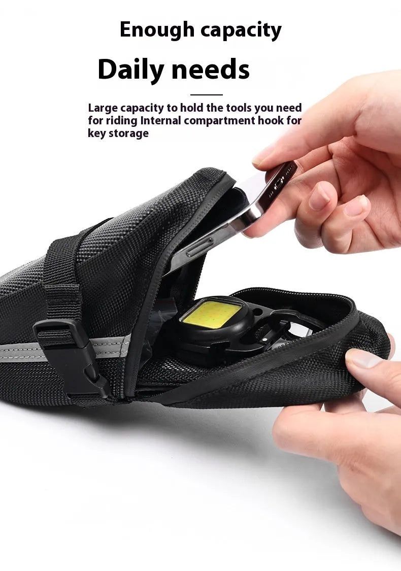 Black polyester quick-release mountain bike tail bag attached to a bicycle saddle, free size with padded interior