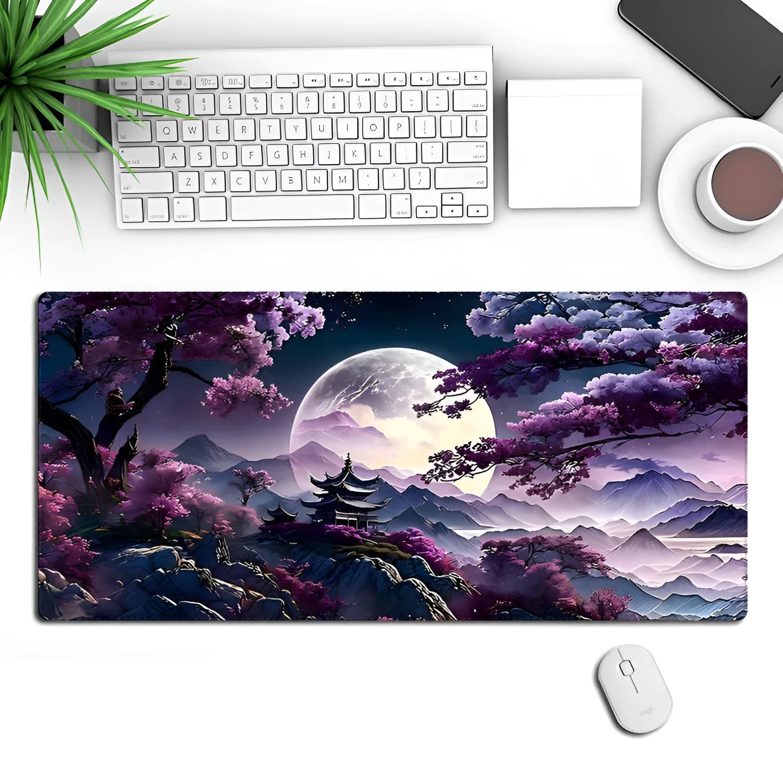 Large black gaming mouse pad with geometric pattern, measuring 40cm by 90cm, on a wooden desk.