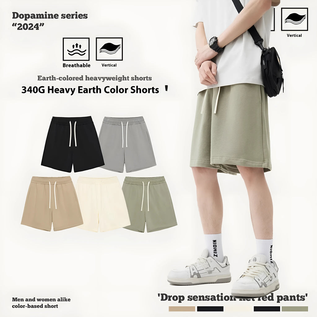 Loose-fit cotton denim shorts for a baby boy or girl in charcoal gray, shown on a size chart.