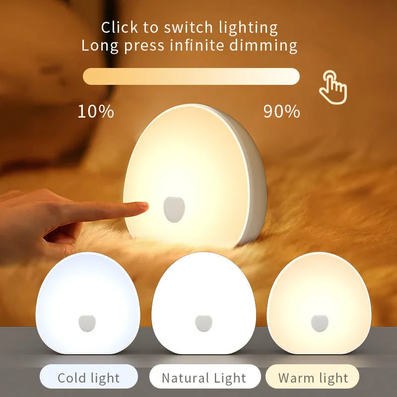 White rechargeable baby night feeding comforter with music function on a plain background.