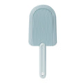 Soft silicone pet hair brush in green, foldable design for portable grooming