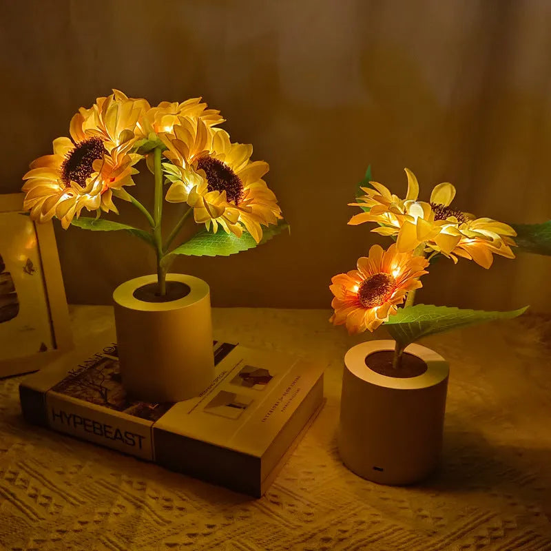 Rechargeable sunflower LED simulation night light with warm glow on a table