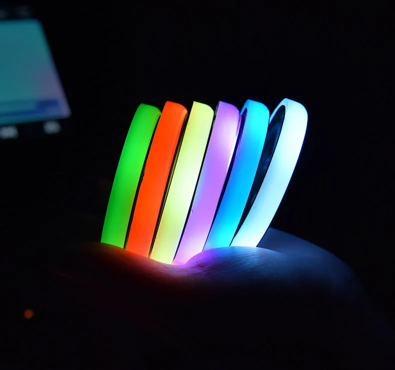 Colourful LED light-up car cup holder coaster showing multiple colour options
