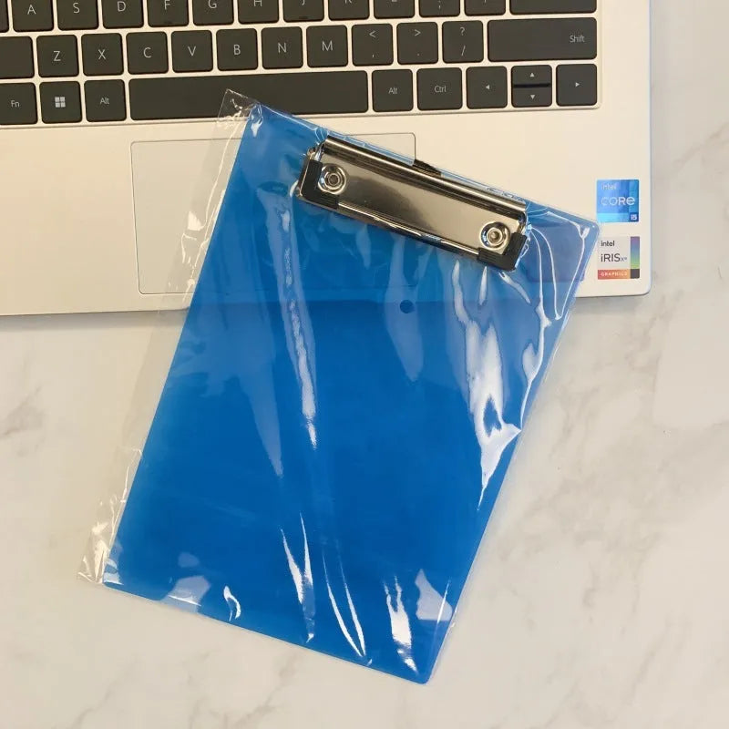 Transparent plastic A4 plate holder with metal clip and integrated writing board surface, shown in blue.