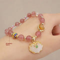 Geometric women's bracelet in gray jade and strawberry quartz with metal ethnic decoration