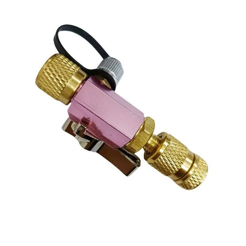 Vacuum valve core disassembly tool set showing metal construction with valve remover and optional wrench