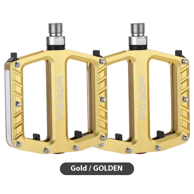 Pair of aluminium alloy bicycle pedals with integrated 710LED lights in black finish