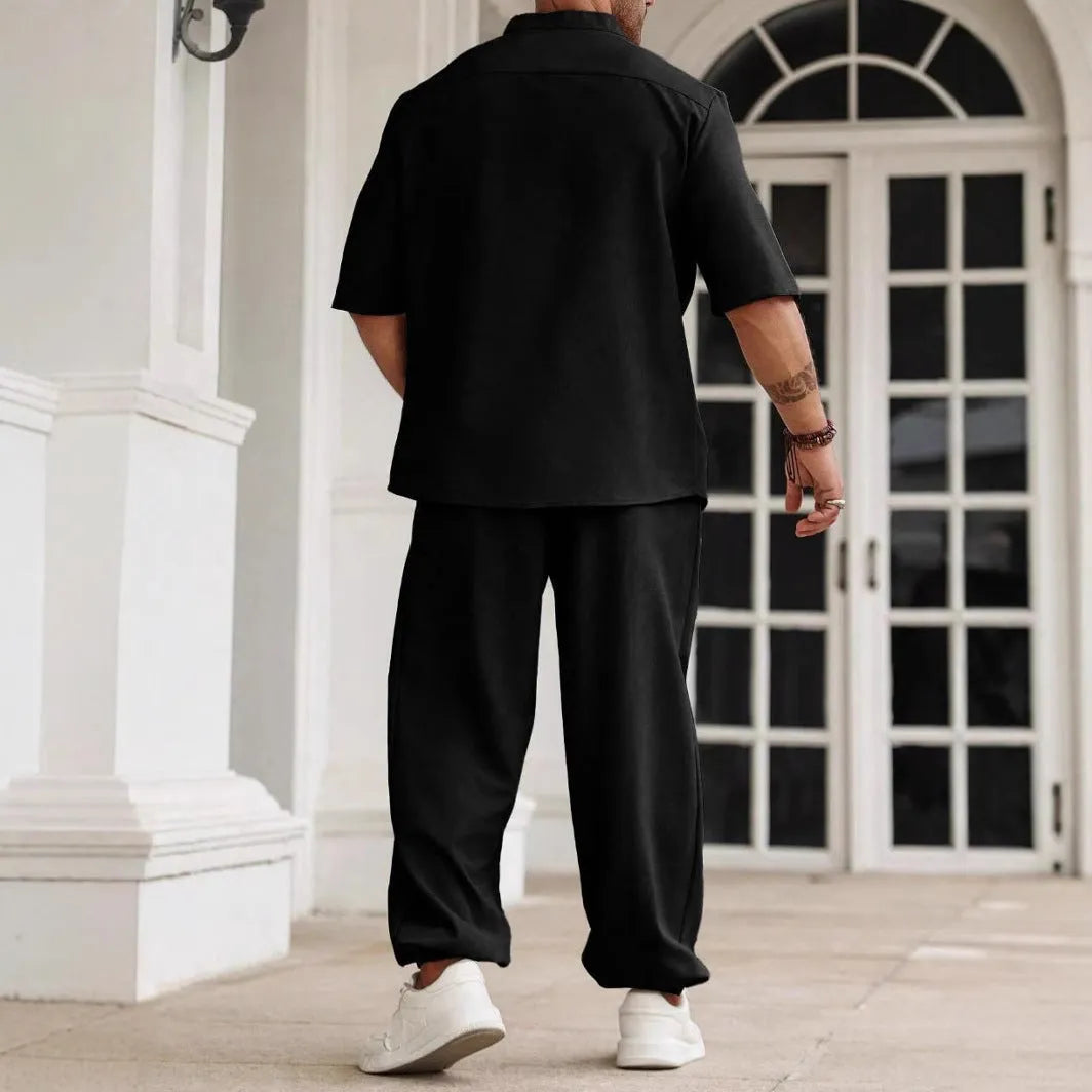 Men's casual cotton linen short-sleeved shirt and long trousers set in apricot, laid flat.