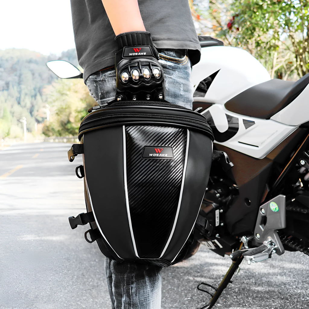 Black motorcycle fuel tank bag with reflective stripe, 15-litre capacity, mounted on a motorcycle seat