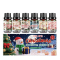 Christmas aromatherapy oil set showing six bottles in two sizes for seasonal home fragrance