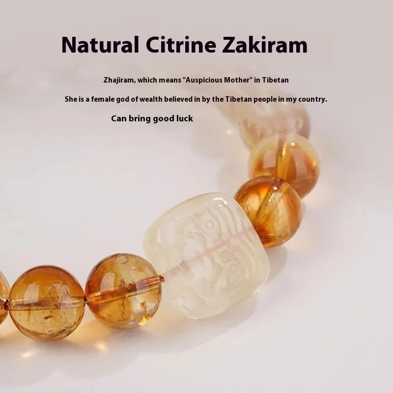 Women's ethnic style carved citrine crystal bracelet with geometric 10mm beads on a white background