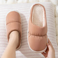 Artificial leather winter house slippers with thick rubber anti-slip soles and plush lining in blue colour