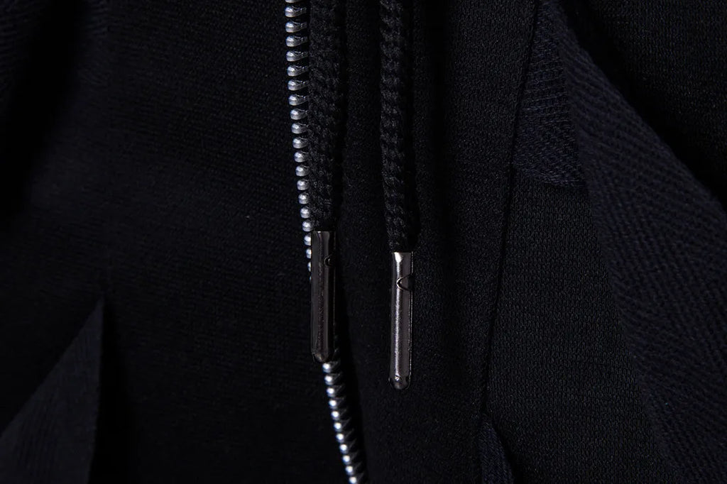 Low crotch cross pants for men in black with tapered leg and small foot opening