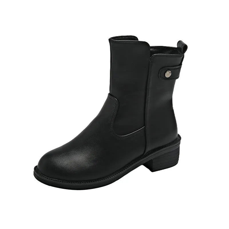 Black women's ankle boots with side zip, round toe, and low rubber sole