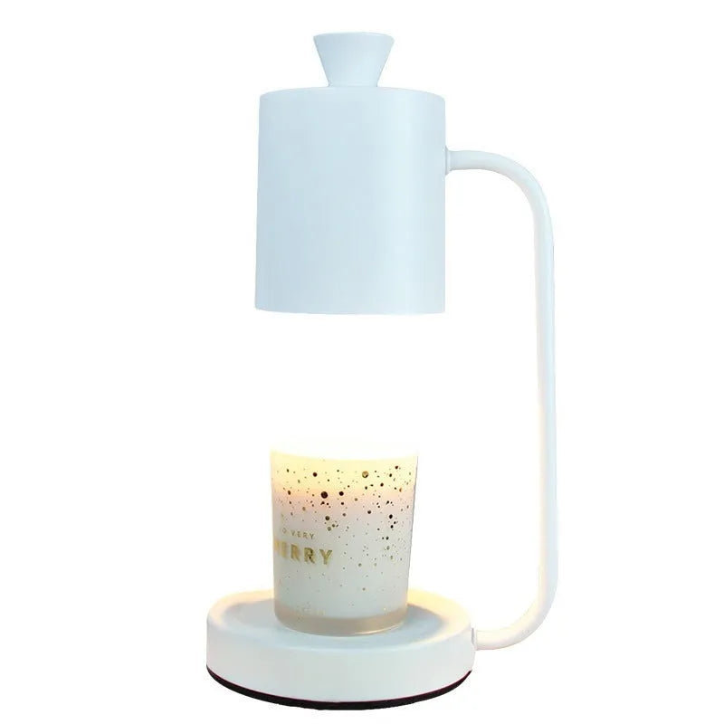 White European-style metal aromatherapy wax lamp with a dimmer switch on a table.