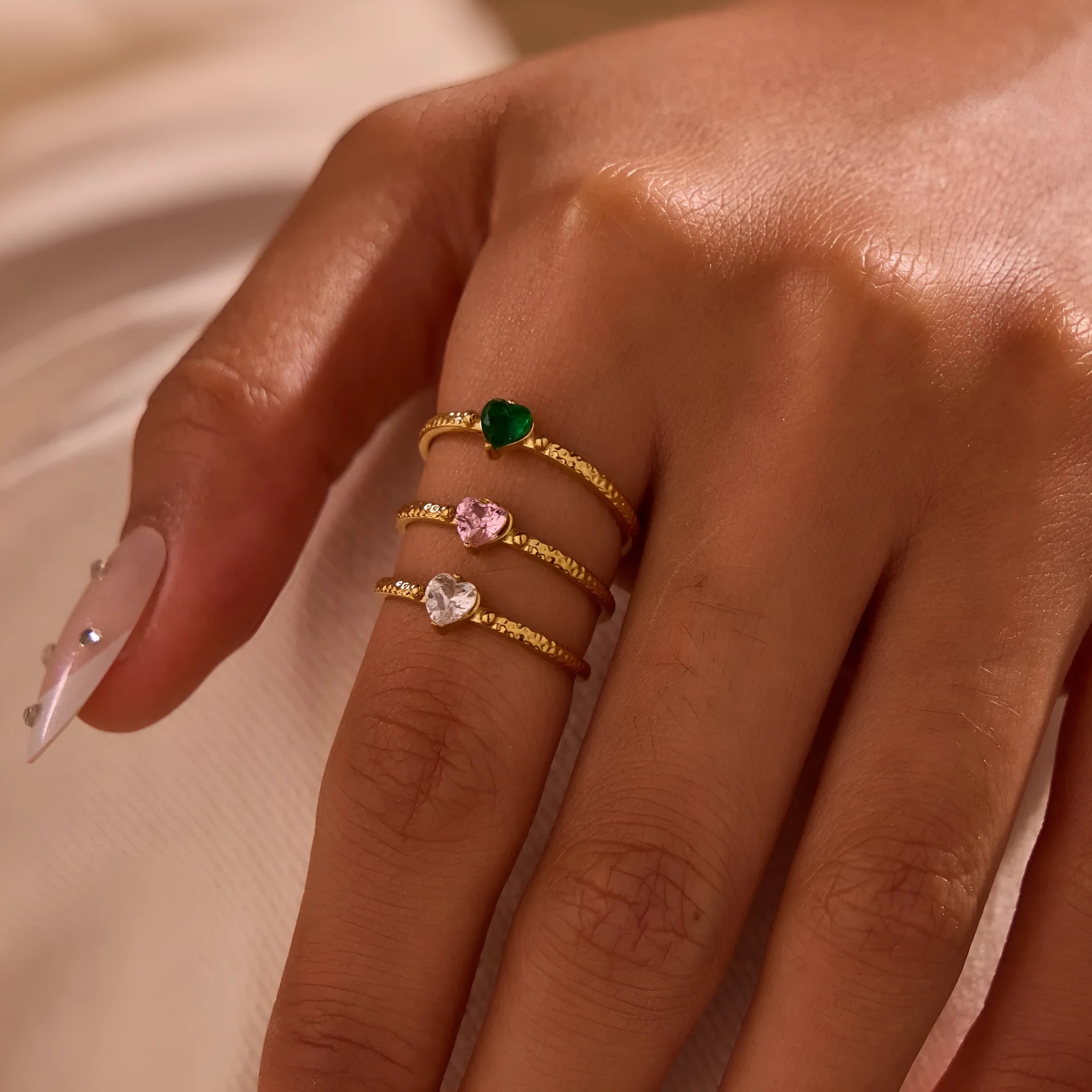 Open-ended stainless steel heart ring with zircon stones in geometric design
