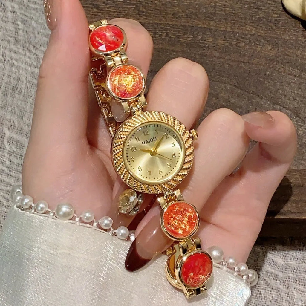 Women's quartz watch with 25mm round dial in zinc alloy case, showing spiral crown and choice of six colours.