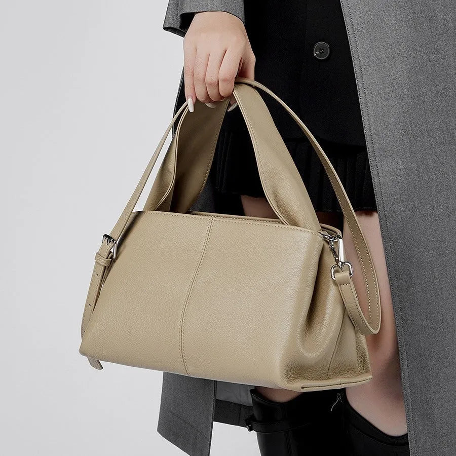 Women's cowhide messenger bag with retro texture in horizontal square shape showing double shoulder straps