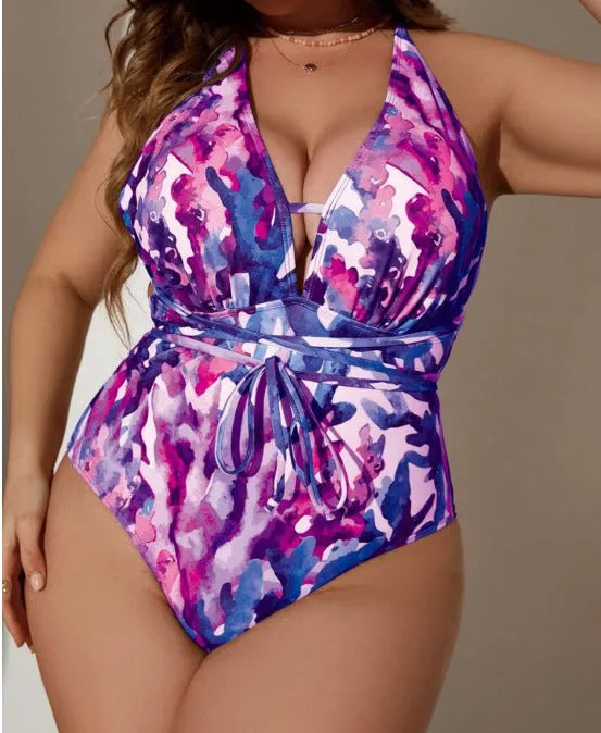 Women's solid blue halter neck one-piece bikini swimsuit on a mannequin