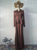 Dark brown retro women's dress with floral pattern, button front, and long sleeves