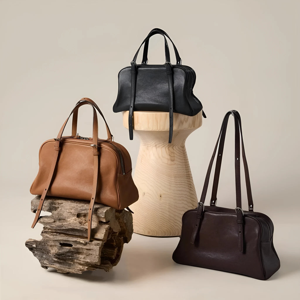 Women's genuine leather retro shoulder bag in horizontal square shape with double strap.