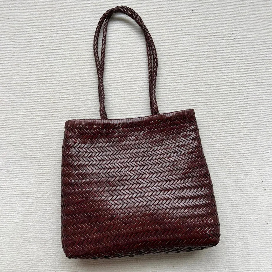 Handmade vintage woven leather shoulder bag in brown with three-dimensional pockets