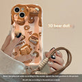 Cream pattern silicone phone case with chocolate bear doll lanyard for iPhone 15 Pro