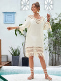 Hand-crocheted apricot-coloured beach dress with a lining, shown as a women's cover-up.