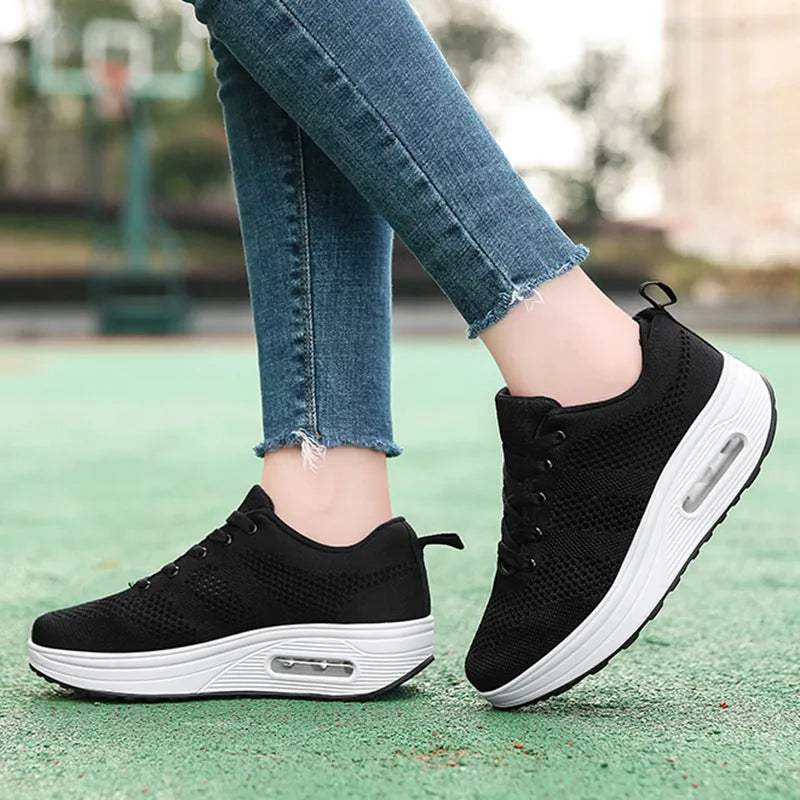 Women's platform air cushion casual shoes with Flyknit upper, non-slip sole, hollow details, and T-shaped ribbon, in solid colour