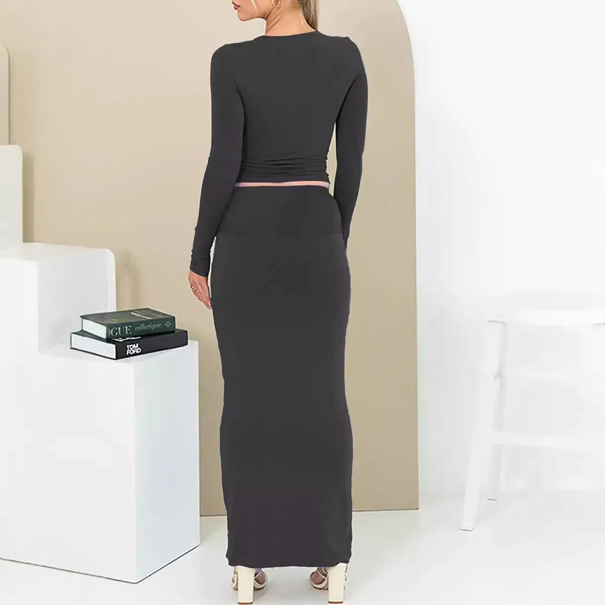 Women's slim fit autumn two-piece suit set in a sweet style with a long skirt and exposed navel top.
