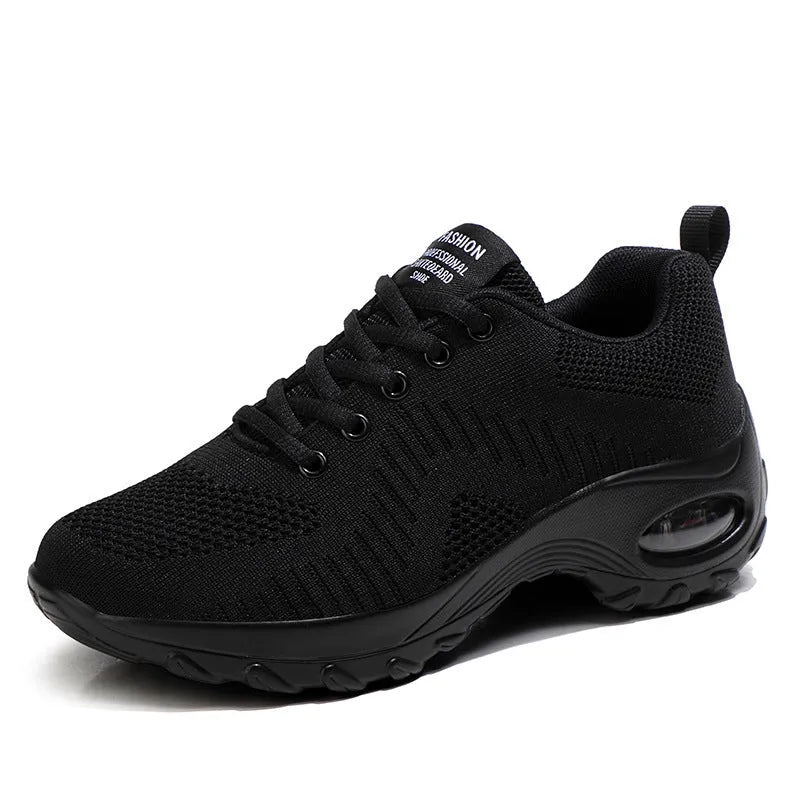 Women's black mesh sneakers with front lace-up design and round toe