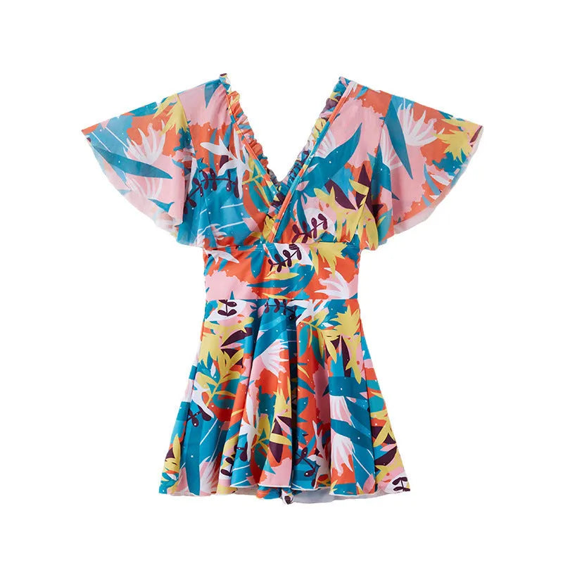 Colourful printed one-piece swimsuit for women available in sizes M to 3XL with belly coverage