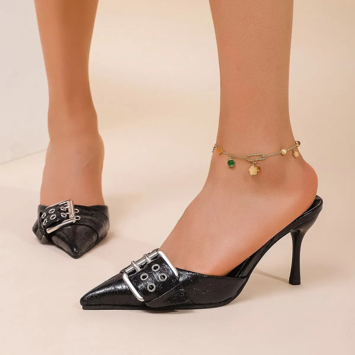 Women's black PU pointed toe high heels with buckle decoration on strap