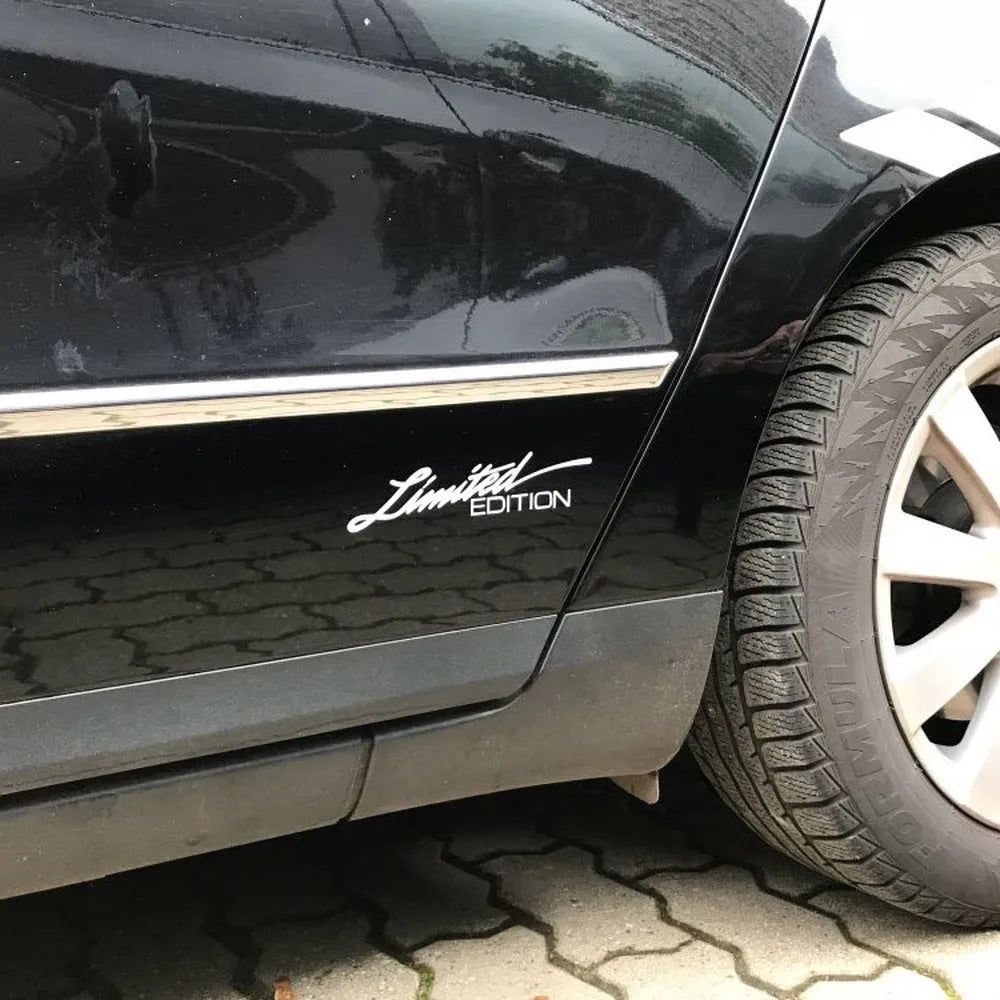 British reflective bumper sticker in black, white, and colourful options showing 16cm x 3.8cm dimensions