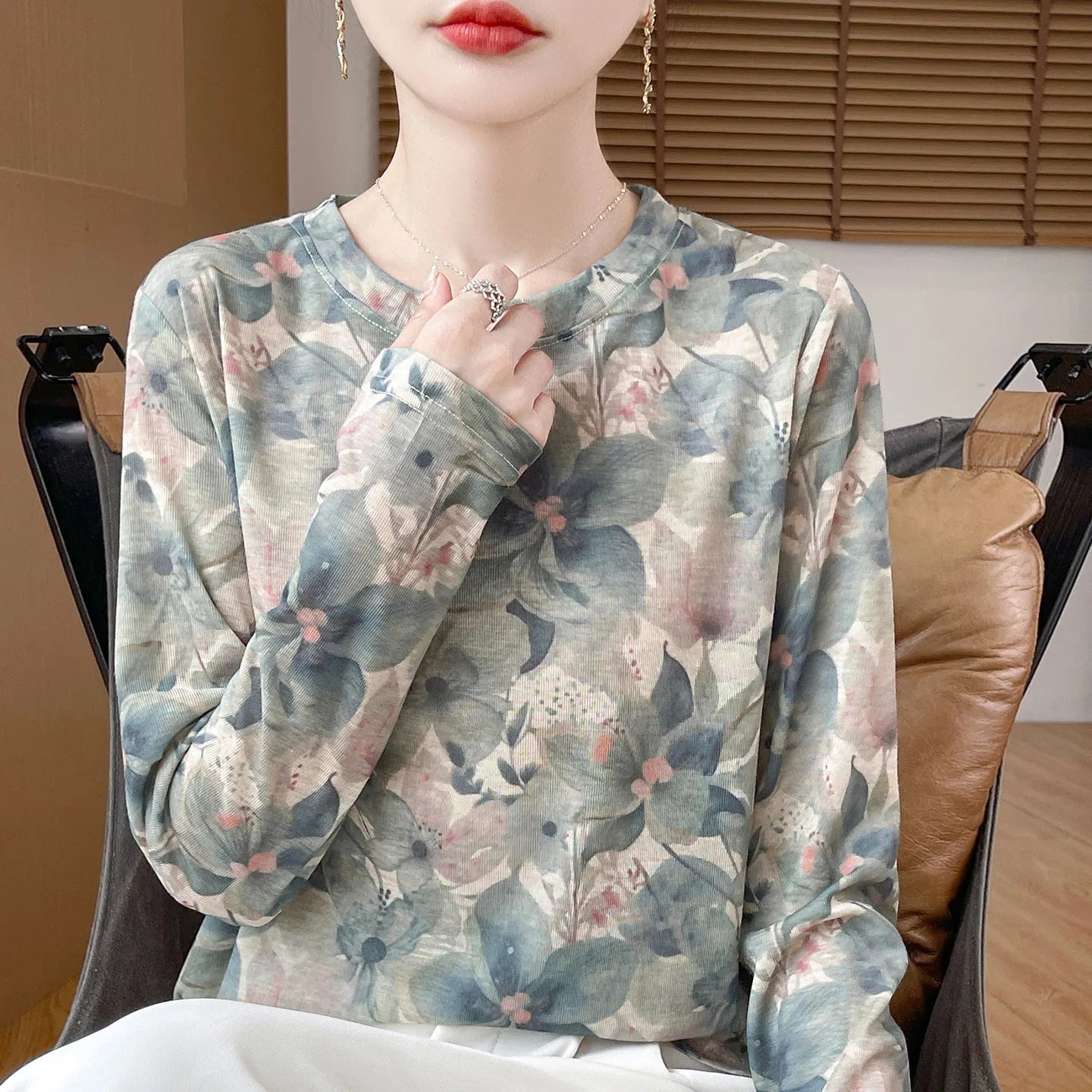 Ladies' round neck pullover shirt with floral printed design in Tencel cotton knit fabric.