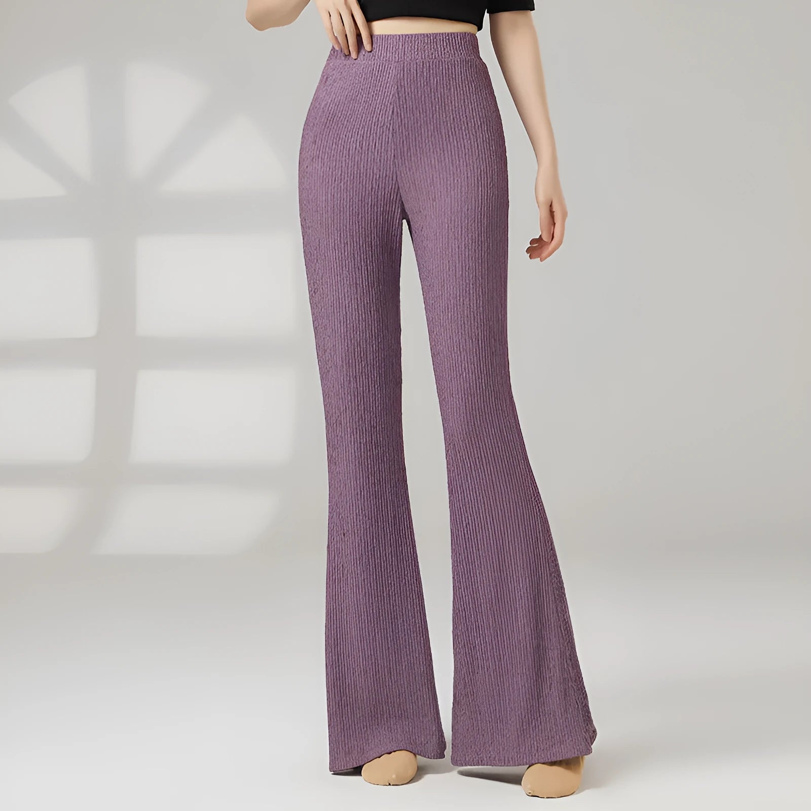 Close-up of solid colour polyester dance practice trousers for women, showing the form-fitting fit.