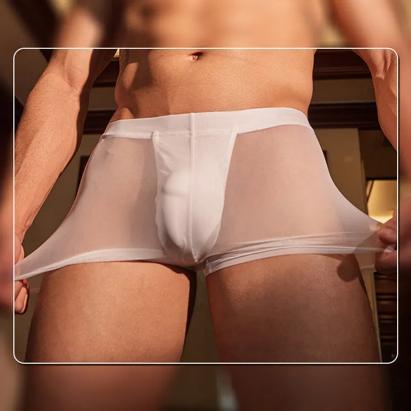 Black ultra-thin nylon men's boxer briefs laid flat, showing low-rise design.
