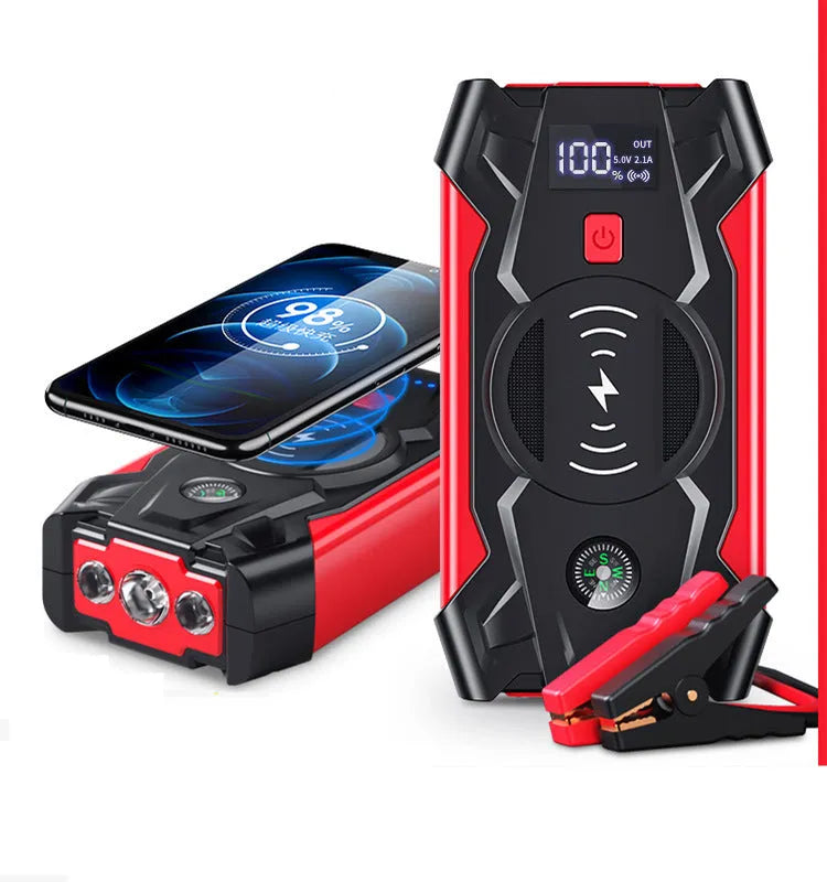 Red car emergency jump starter power bank with digital display and heavy-duty battery clips