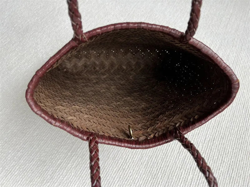 Handmade vintage woven leather shoulder bag in brown with three-dimensional pockets