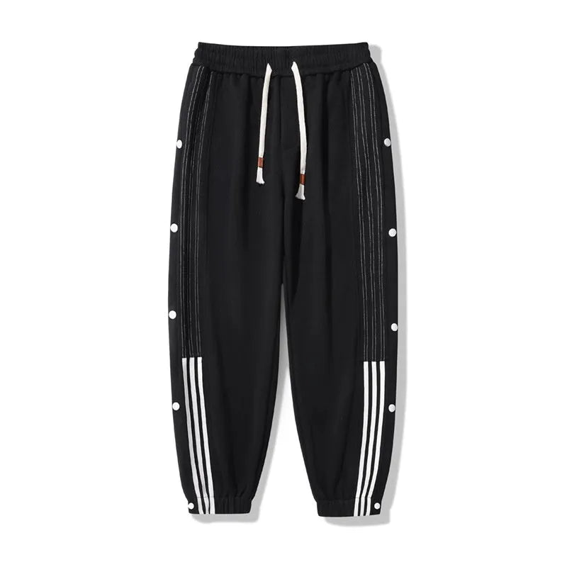 Men's loose grey ankle-tied sports sweatpants with drawstring waist