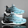 Low-top youth sneaker with a rotating button closure on a rubber sole, shown in light blue mesh.