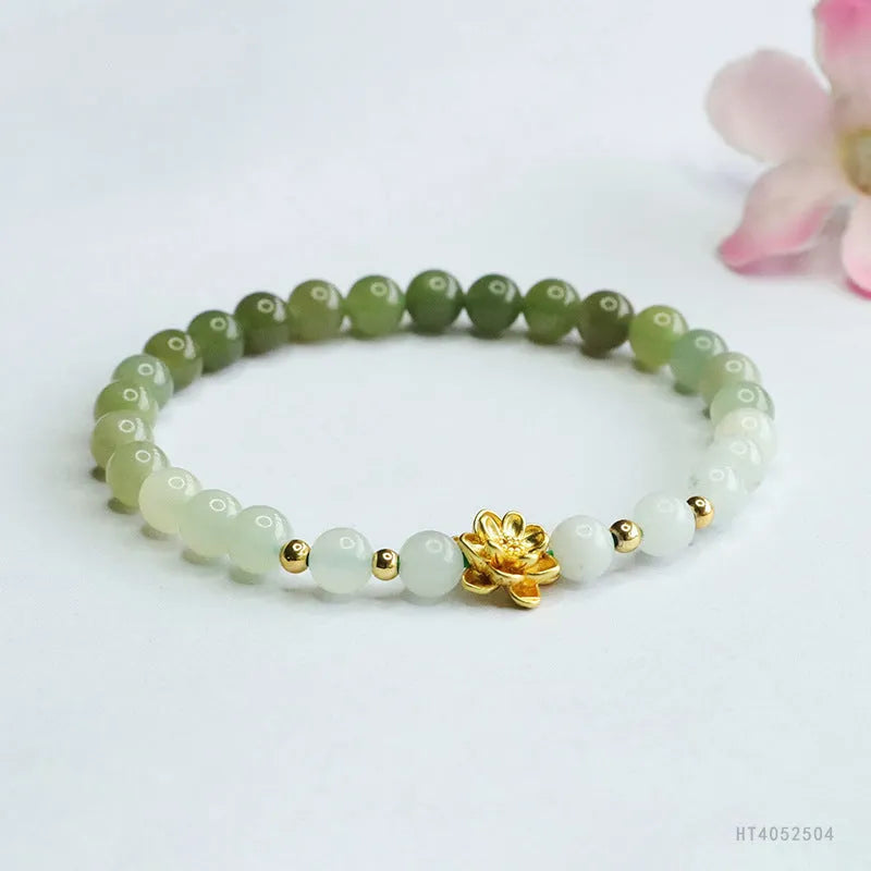 Hand-woven Hetian jade bracelet with a clear water gradient and national style floral design.